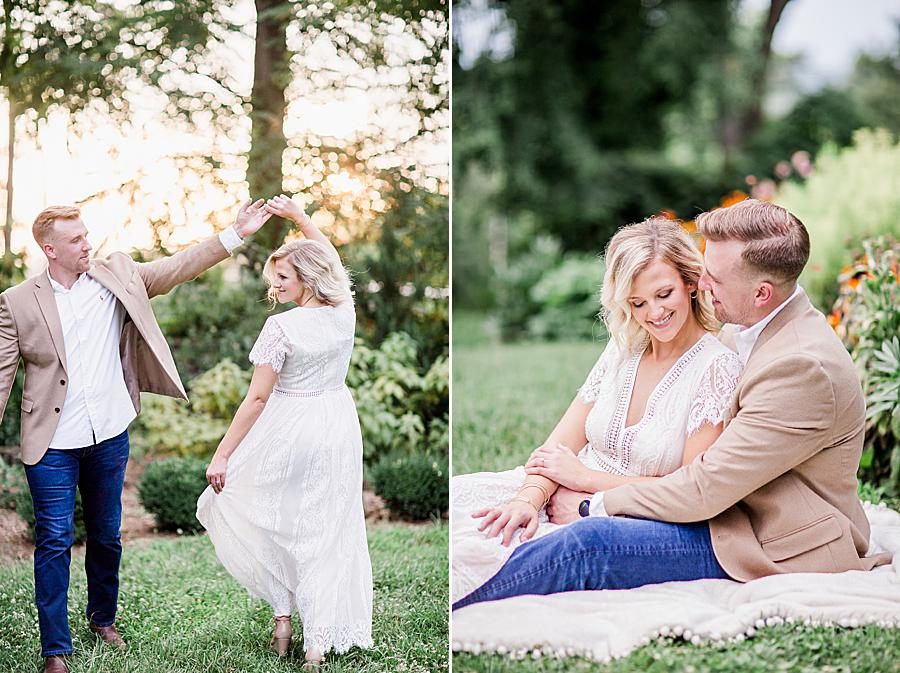 Sitting on a blanket at this Knoxville Botanical Gardens engagement by Knoxville Wedding Photographer, Amanda May Photos.