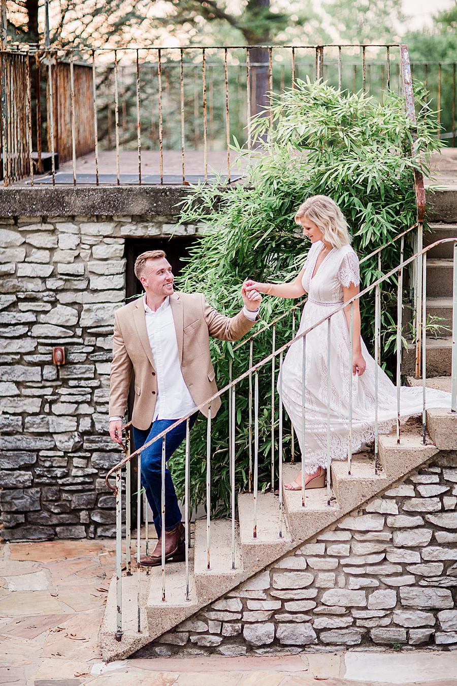 Walking down stairs by Knoxville Wedding Photographer, Amanda May Photos.