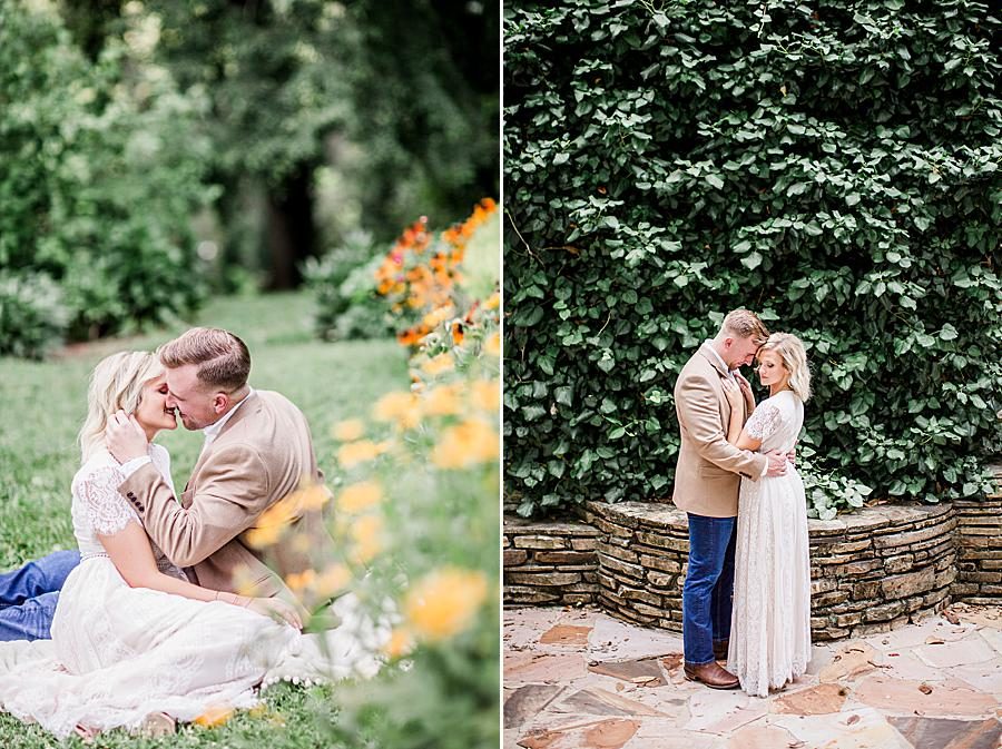 Kissing in the grass by Knoxville Wedding Photographer, Amanda May Photos.
