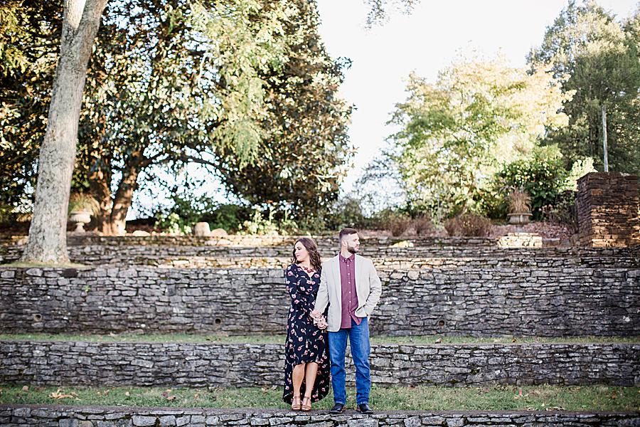 Holding hands at this Knoxville Botanical Gardens Engagement by Knoxville Wedding Photographer, Amanda May Photos.