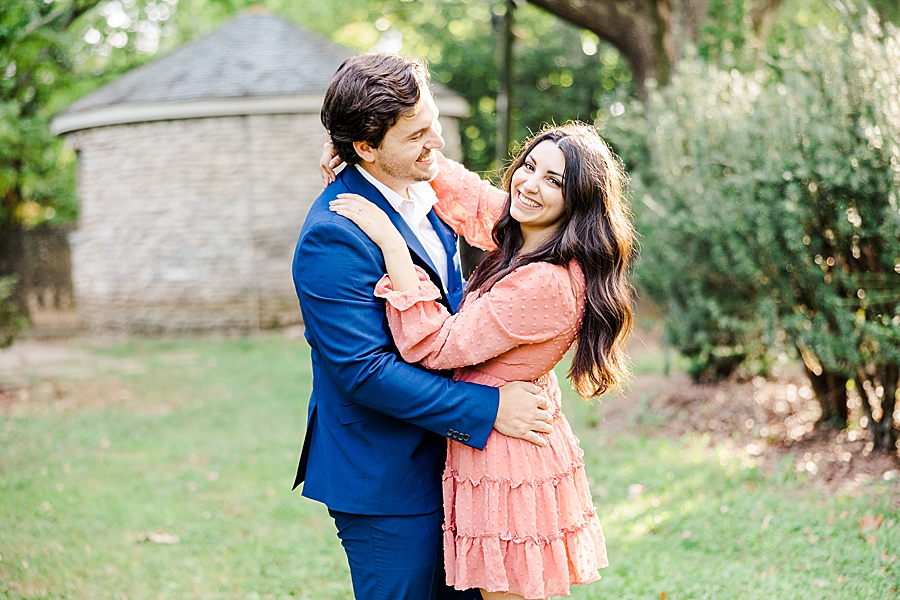 arms on shoulders at knoxville botanical garden engagement