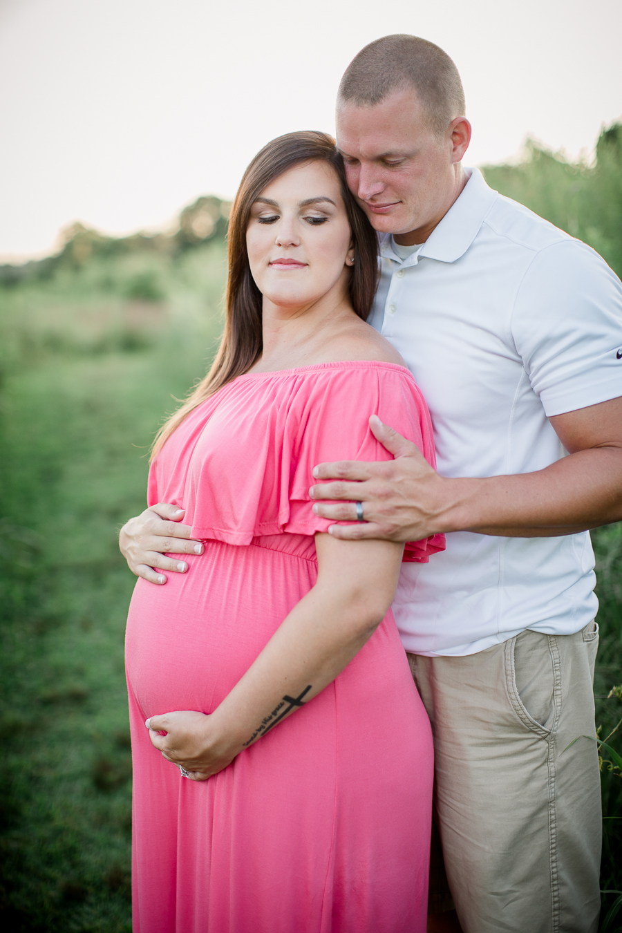 His hand on her arm at this Sterchi Hills maternity session by Knoxville Wedding Photographer, Amanda May Photos.