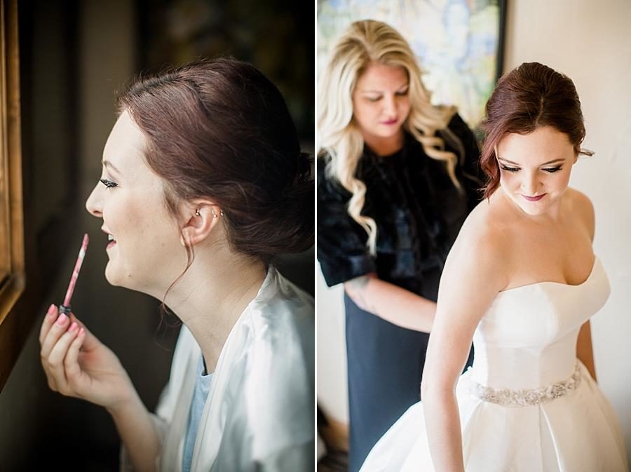 Zipping the dress at this Colorado Destination Wedding by Knoxville Wedding Photographer, Amanda May Photos.