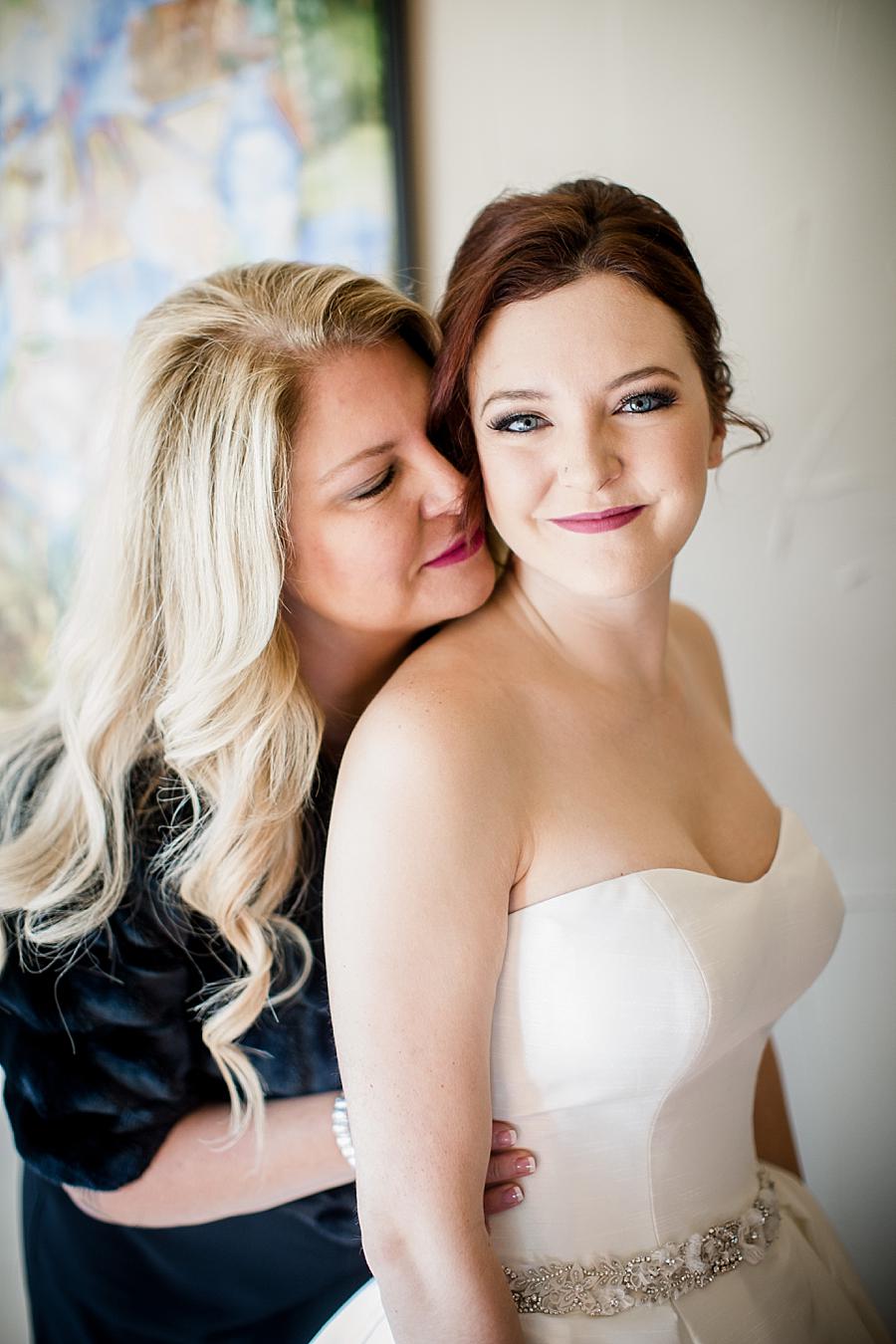 Snuggles with mom at this Colorado Destination Wedding by Knoxville Wedding Photographer, Amanda May Photos.
