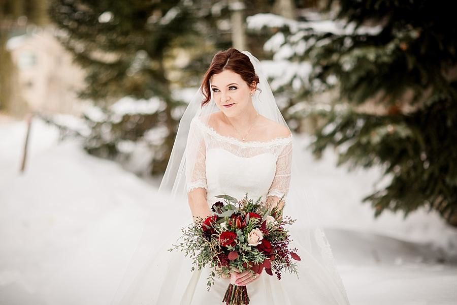 Winter themed bouquet at this Colorado Destination Wedding by Knoxville Wedding Photographer, Amanda May Photos.