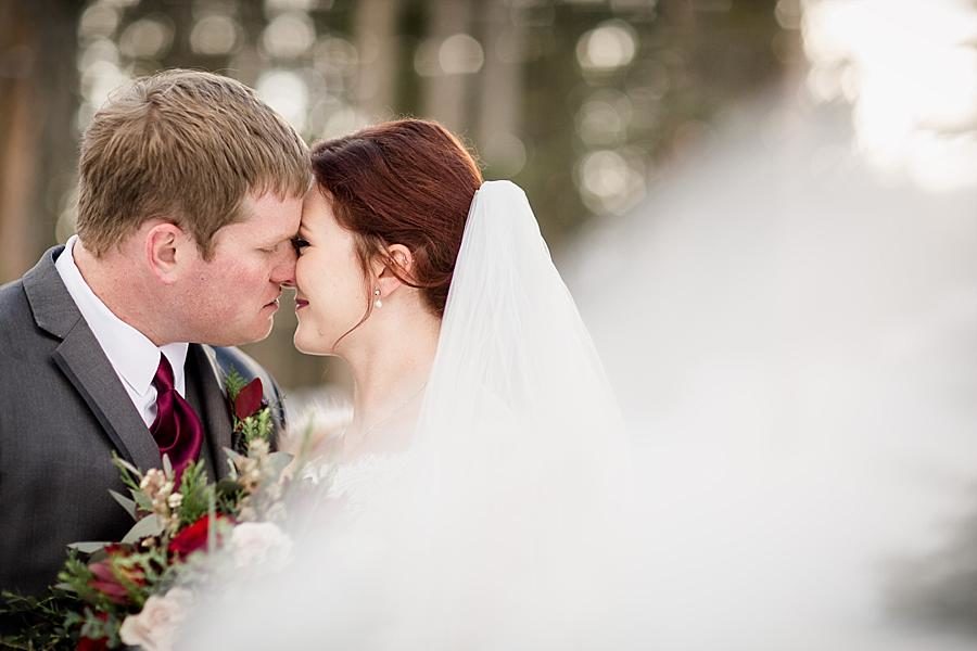 Snow kisses at this Colorado Destination Wedding by Knoxville Wedding Photographer, Amanda May Photos.