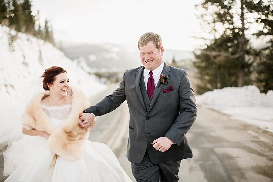 Running together at this Colorado Destination Wedding by Knoxville Wedding Photographer, Amanda May Photos.