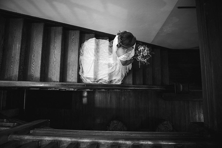 Bride walking down stairs at this Historic Westwood Bridal session by Knoxville Wedding Photographer, Amanda May Photos.