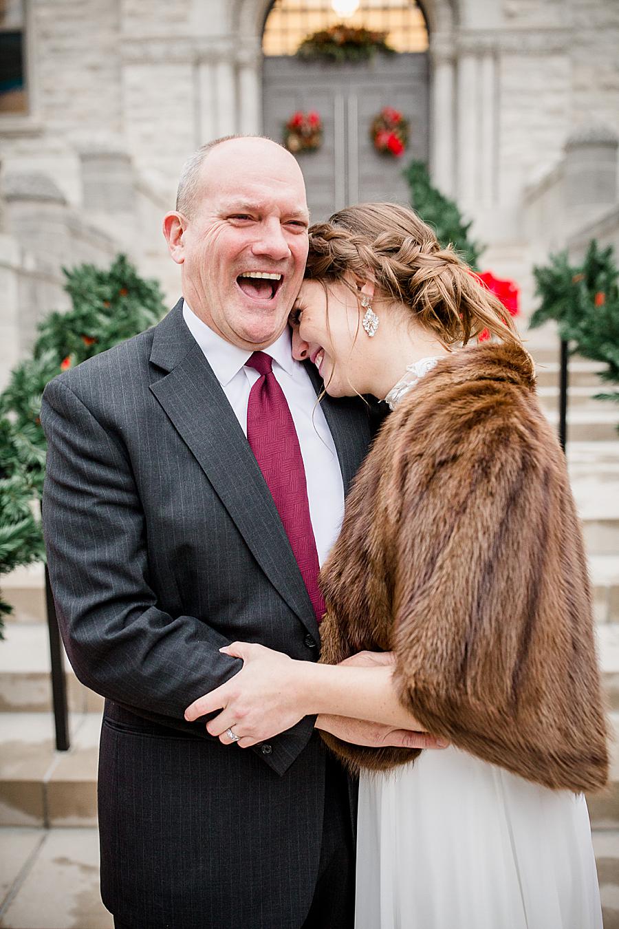 Hugging dad at this Lexington Courthouse Wedding by Knoxville Wedding Photographer, Amanda May Photos. 