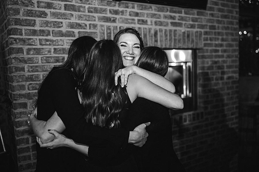 Hugging guests at this Lexington Courthouse Wedding by Knoxville Wedding Photographer, Amanda May Photos. 