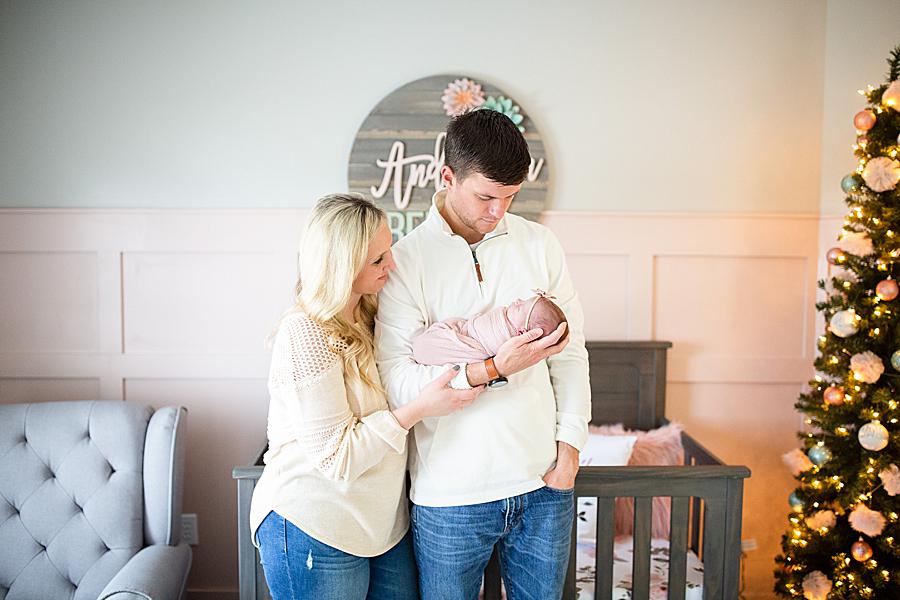 Dad holding newborn daughter at this lifestyle newborn by Knoxville Wedding Photographer, Amanda May Photos.
