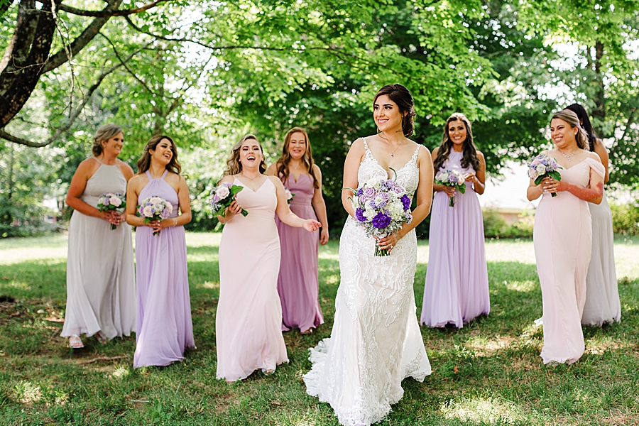 bride walking with bridesmaids at this lighthouse knoxville wedding