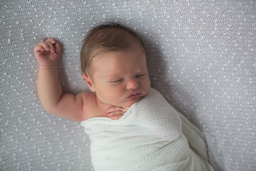 One arm out at this newborn session by Knoxville Wedding Photographer, Amanda May Photos.