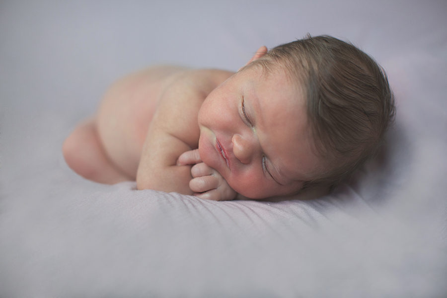 Hands under cheek at this newborn session by Knoxville Wedding Photographer, Amanda May Photos.