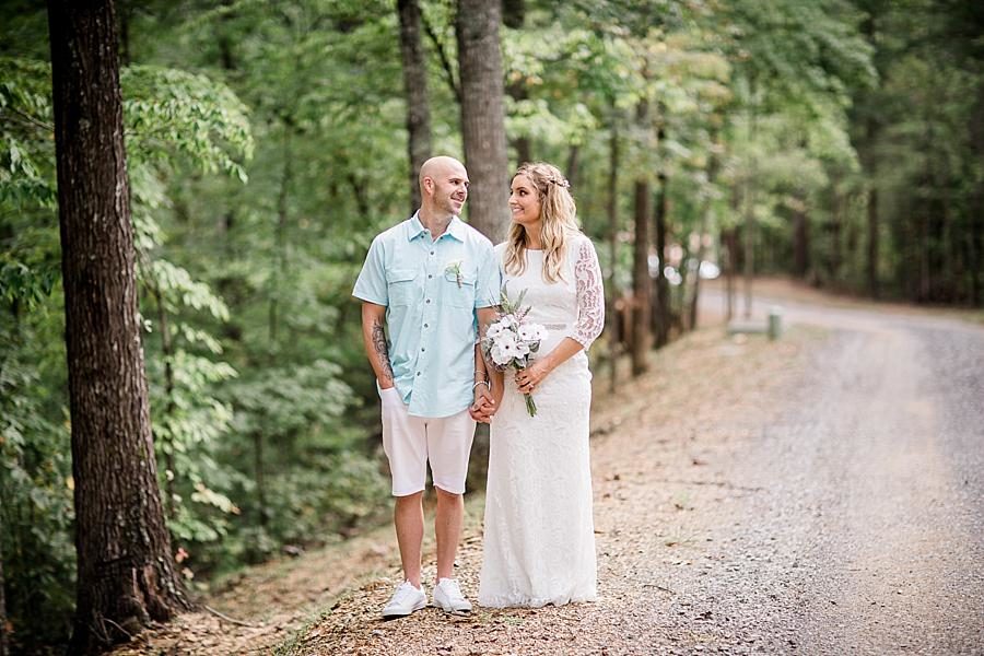 Holding hands at this Parkside Resort Destination Wedding by Knoxville Wedding Photographer, Amanda May Photos.