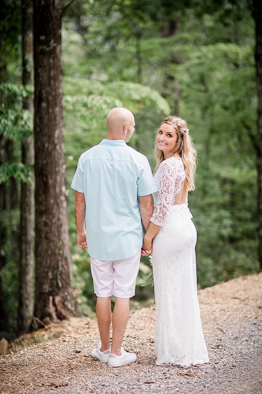Looking over the shoulder at this Parkside Resort Destination Wedding by Knoxville Wedding Photographer, Amanda May Photos.