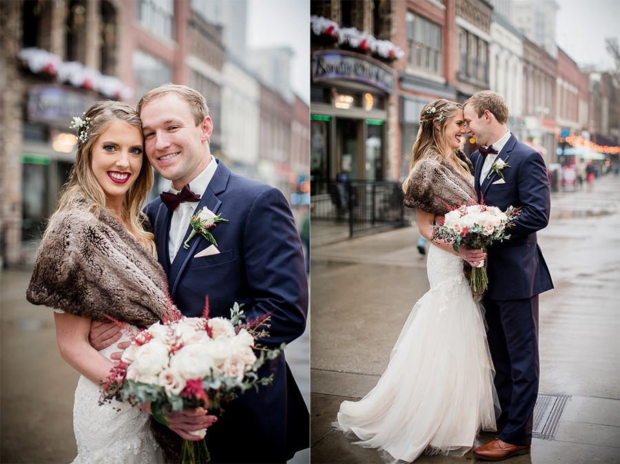 Foreheads together in market square during the bride and groom romantic portraits at this winter wedding at Knoxville Wedding Venue, Jackson Terminal, by Knoxville Wedding Photographer, Amanda May Photos.