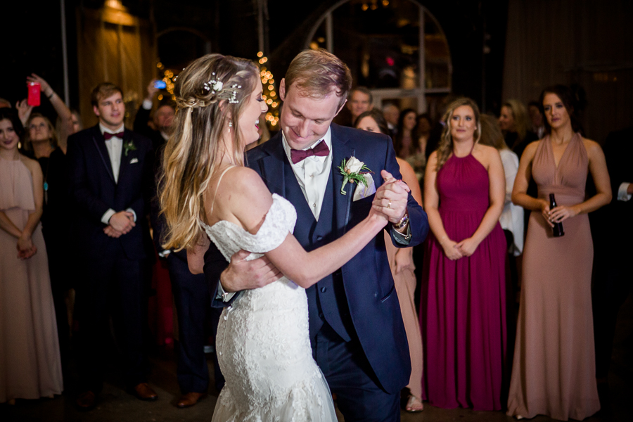 First dance sway during the reception pictures at this winter wedding at Knoxville Wedding Venue, Jackson Terminal, by Knoxville Wedding Photographer, Amanda May Photos.