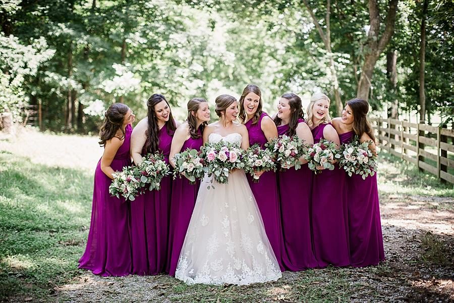 Line of bouquets at this RiverView Family Farm Wedding by Knoxville Wedding Photographer, Amanda May Photos.