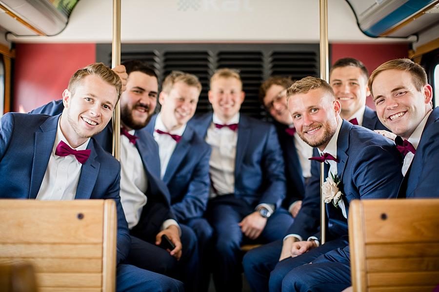 Groomsmen on the trolley at this RiverView Family Farm Wedding by Knoxville Wedding Photographer, Amanda May Photos.