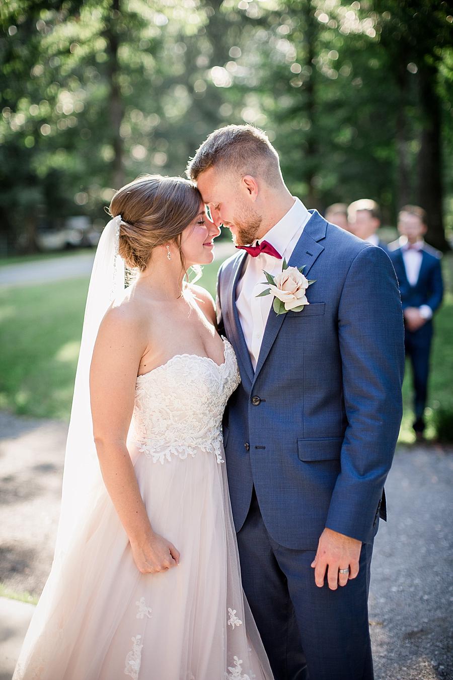Forehead to forehead at this RiverView Family Farm Wedding by Knoxville Wedding Photographer, Amanda May Photos.