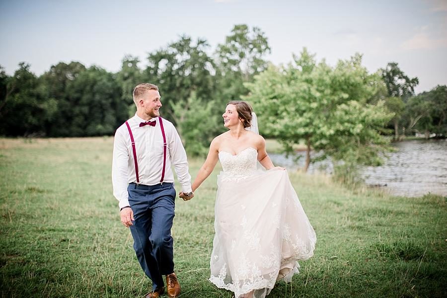 Along the river at this RiverView Family Farm Wedding by Knoxville Wedding Photographer, Amanda May Photos.