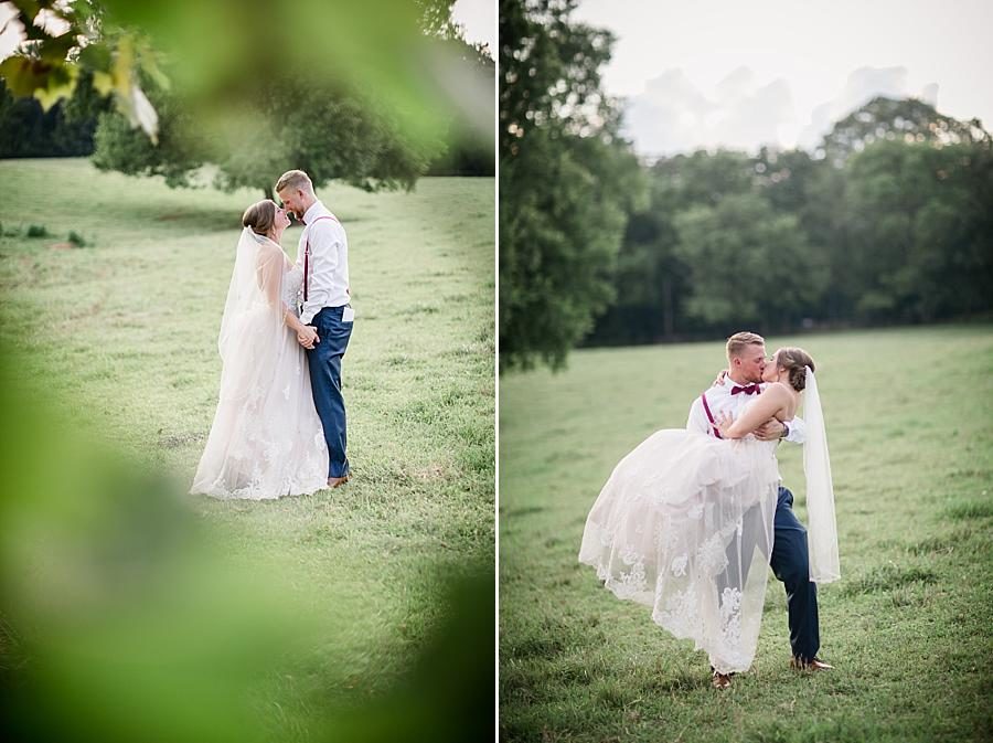 Princess carry at this RiverView Family Farm Wedding by Knoxville Wedding Photographer, Amanda May Photos.