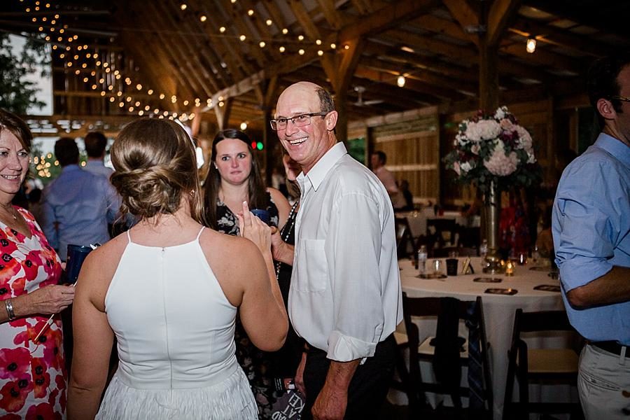 Enjoying the reception at this RiverView Family Farm Wedding by Knoxville Wedding Photographer, Amanda May Photos.