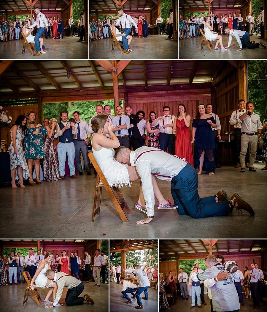 Getting the garter at this RiverView Family Farm Wedding by Knoxville Wedding Photographer, Amanda May Photos.