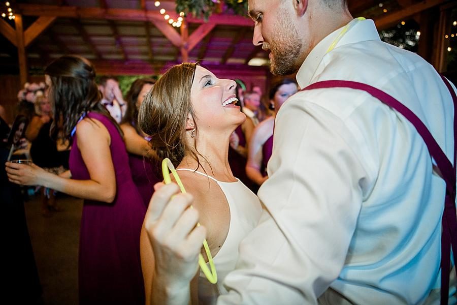 Dancing with glow sticks at this RiverView Family Farm Wedding by Knoxville Wedding Photographer, Amanda May Photos.