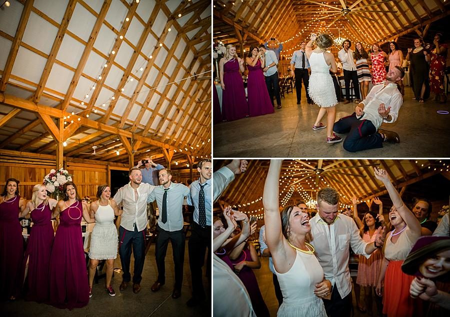 Air guitar at this RiverView Family Farm Wedding by Knoxville Wedding Photographer, Amanda May Photos.