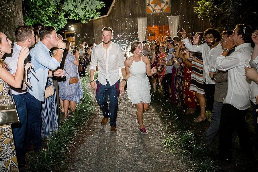 Bubble exit at this RiverView Family Farm Wedding by Knoxville Wedding Photographer, Amanda May Photos.