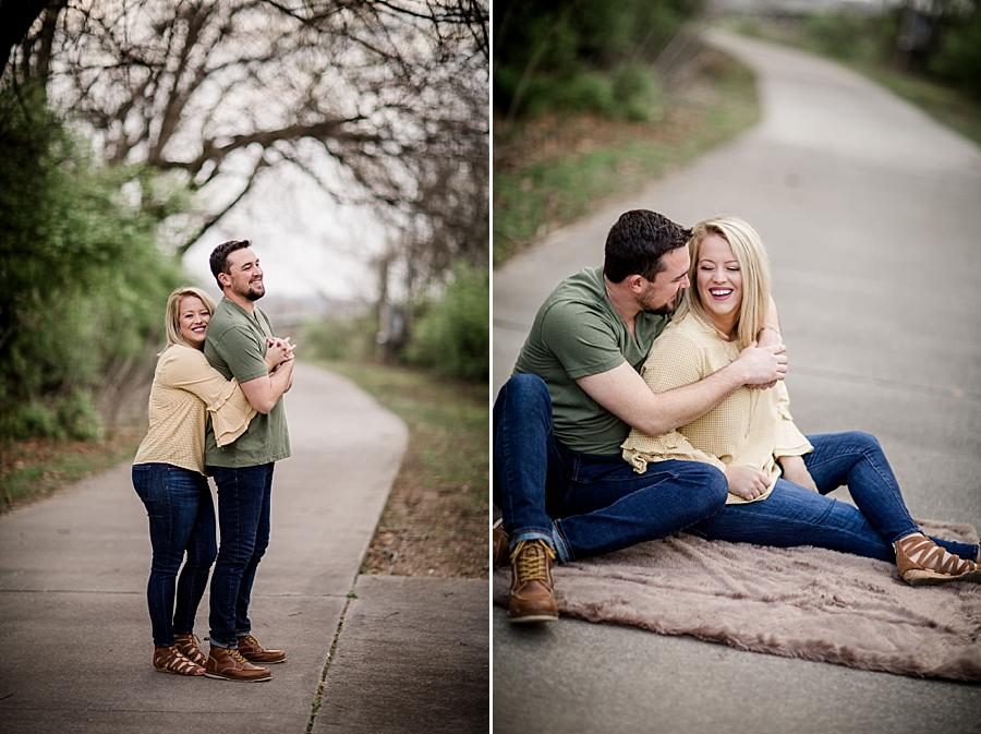 She hugs him from behind at this just married Volunteer Landing session by Knoxville Wedding Photographer, Amanda May Photos.