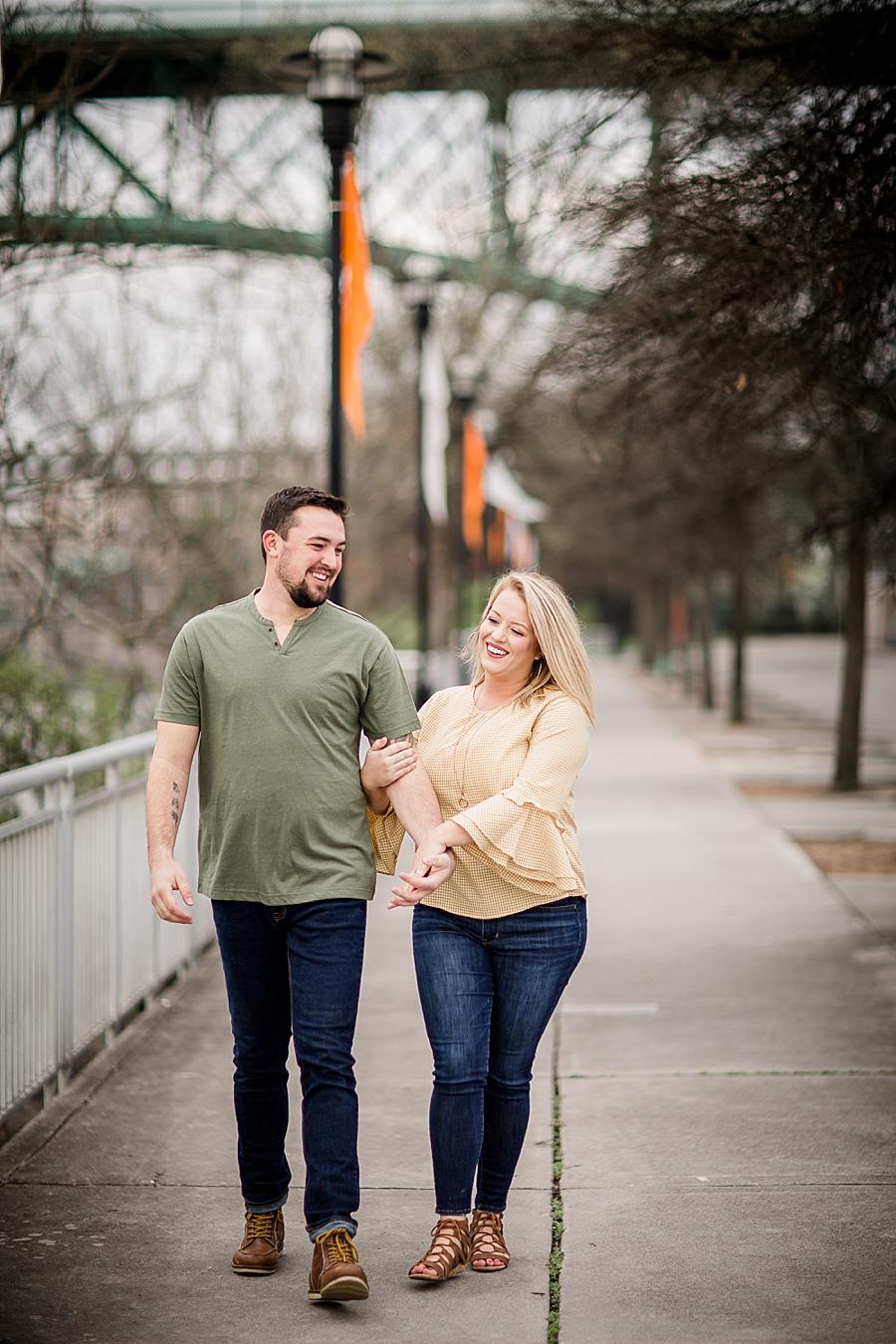 Walking together at this just married Volunteer Landing session by Knoxville Wedding Photographer, Amanda May Photos.