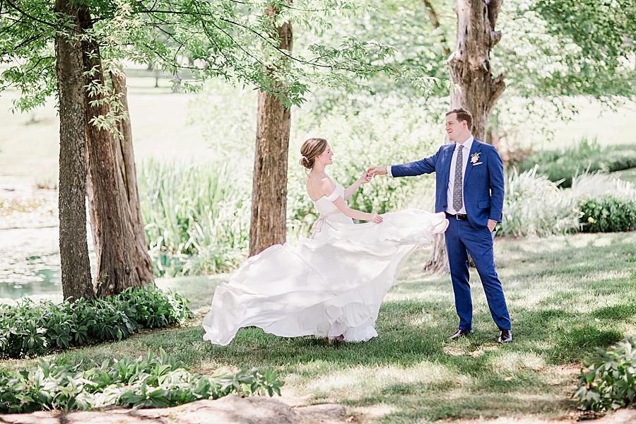 Twirling at this Marblegate Farm Wedding by Knoxville Wedding Photographer, Amanda May Photos.