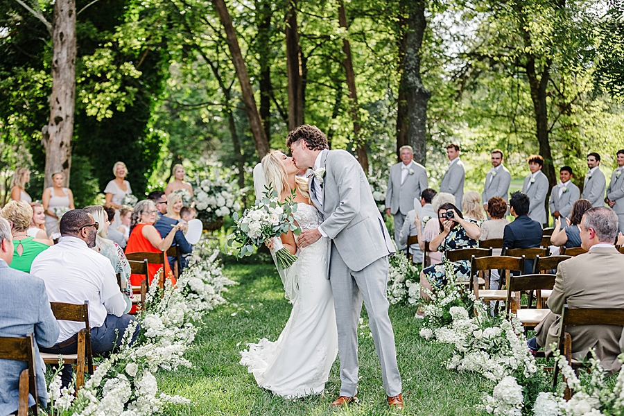 kissing at this marblegate farm wedding