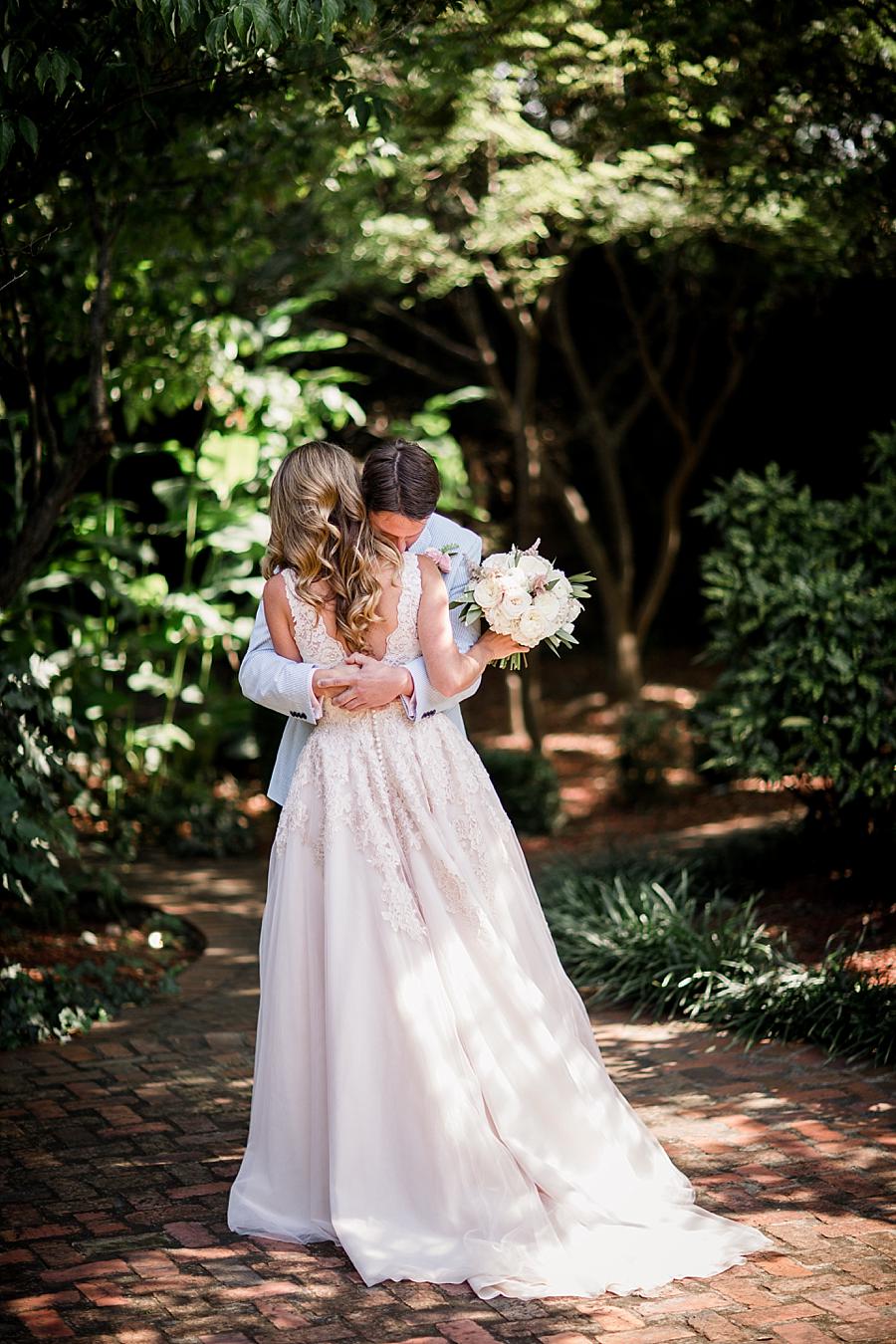 Hugging on first look at this East Ivy Mansion Wedding session by Knoxville Wedding Photographer, Amanda May Photos.