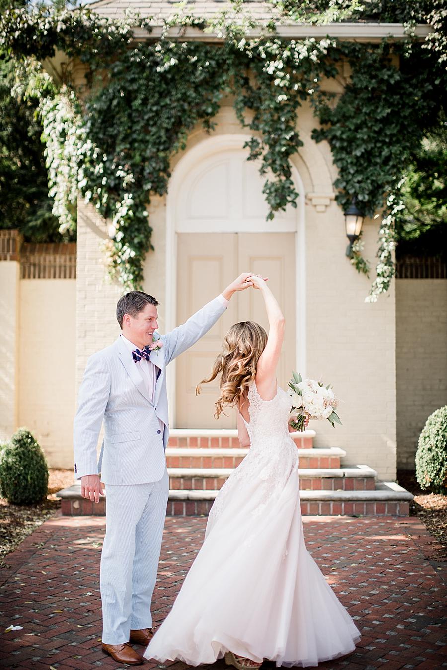 Spinning at this East Ivy Mansion Wedding session by Knoxville Wedding Photographer, Amanda May Photos.
