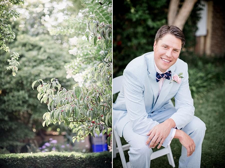 Groom sitting in chair at this East Ivy Mansion Wedding session by Knoxville Wedding Photographer, Amanda May Photos.
