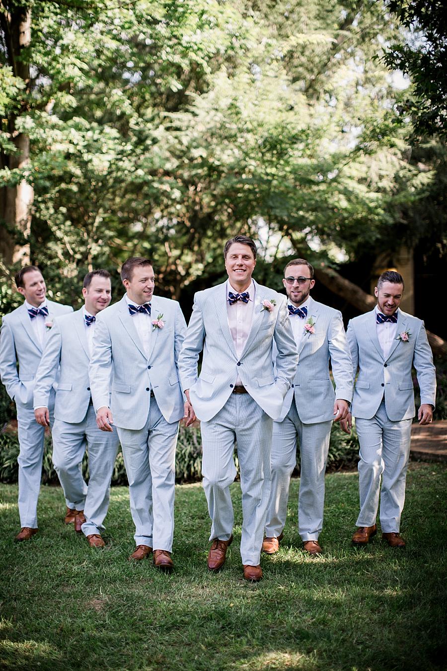 Groomsmen walking at this East Ivy Mansion Wedding session by Knoxville Wedding Photographer, Amanda May Photos.