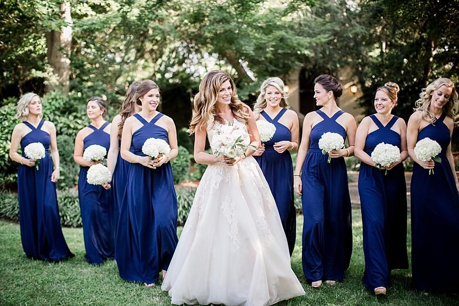 Bride walking with bridesmaids at this East Ivy Mansion Wedding session by Knoxville Wedding Photographer, Amanda May Photos.