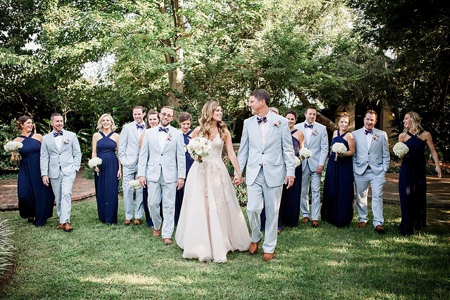 Wedding party walking at this East Ivy Mansion Wedding session by Knoxville Wedding Photographer, Amanda May Photos.