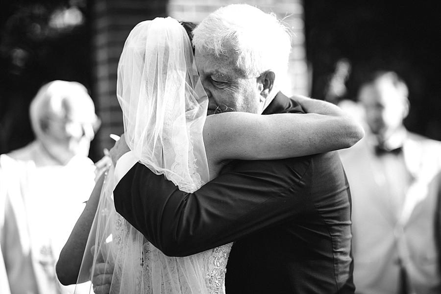Bride hugging father at this East Ivy Mansion Wedding session by Knoxville Wedding Photographer, Amanda May Photos.
