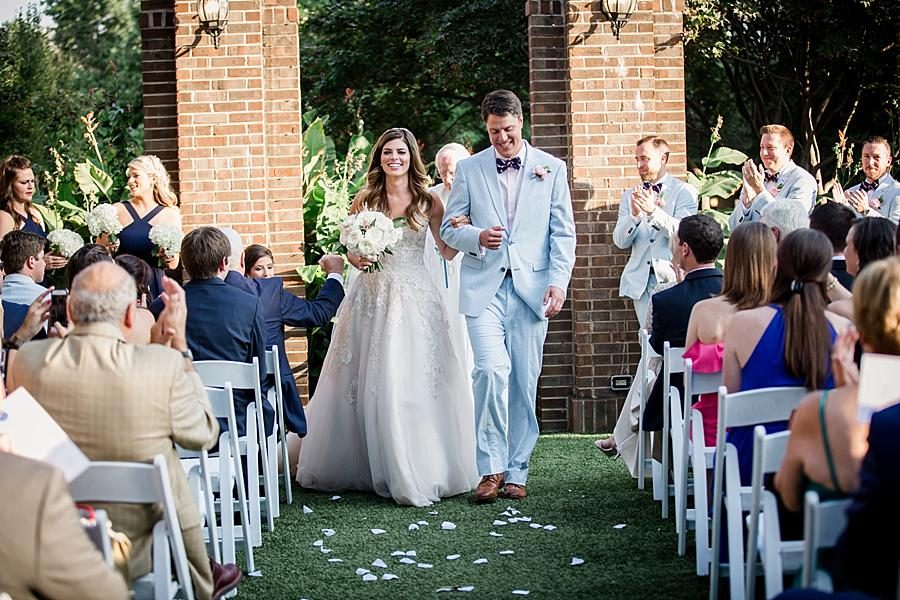 Walking holding hands at this East Ivy Mansion Wedding session by Knoxville Wedding Photographer, Amanda May Photos.