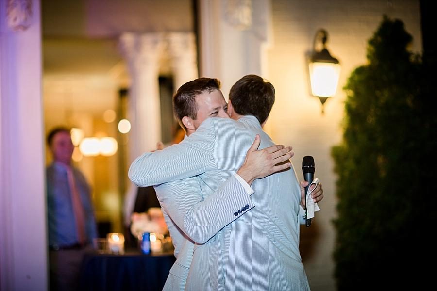 Groomsmen hugging groom at this East Ivy Mansion Wedding session by Knoxville Wedding Photographer, Amanda May Photos.