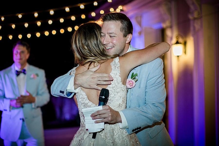Bride hugging groomsmen at this East Ivy Mansion Wedding session by Knoxville Wedding Photographer, Amanda May Photos.