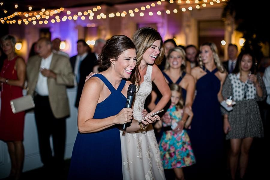 Bride laughing with bridesmaid at this East Ivy Mansion Wedding session by Knoxville Wedding Photographer, Amanda May Photos.