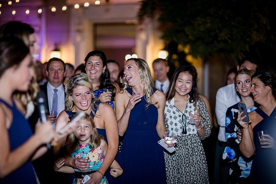Guests laughing at this East Ivy Mansion Wedding session by Knoxville Wedding Photographer, Amanda May Photos.