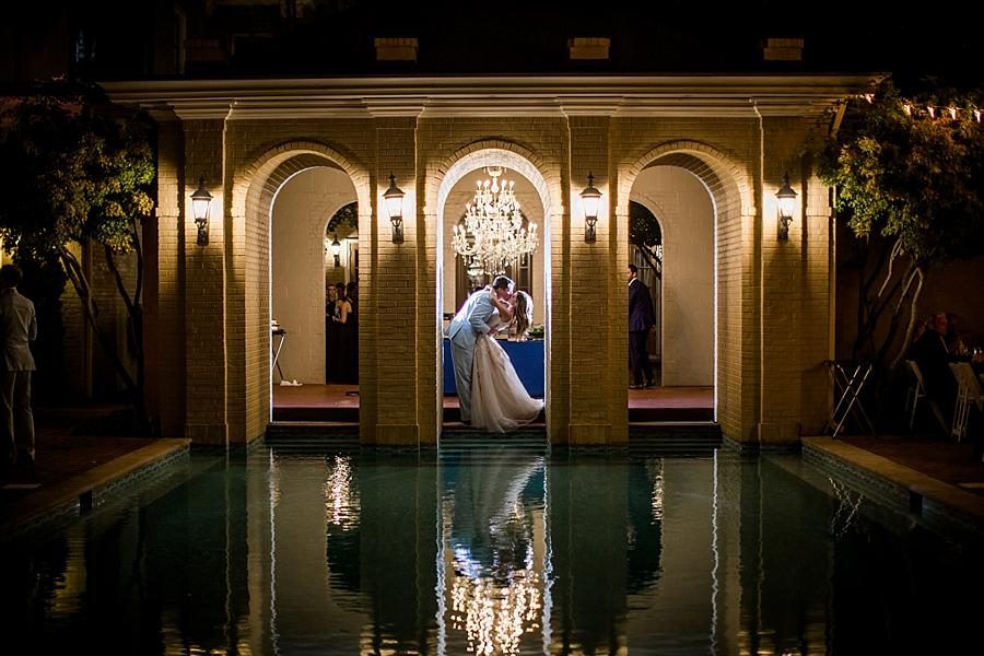 Couple kissing in archway at this East Ivy Mansion Wedding session by Knoxville Wedding Photographer, Amanda May Photos.