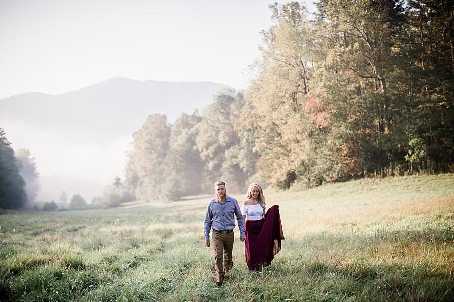 Walking holding hands at this Townsend Anniversary session by Knoxville Wedding Photographer, Amanda May Photos.